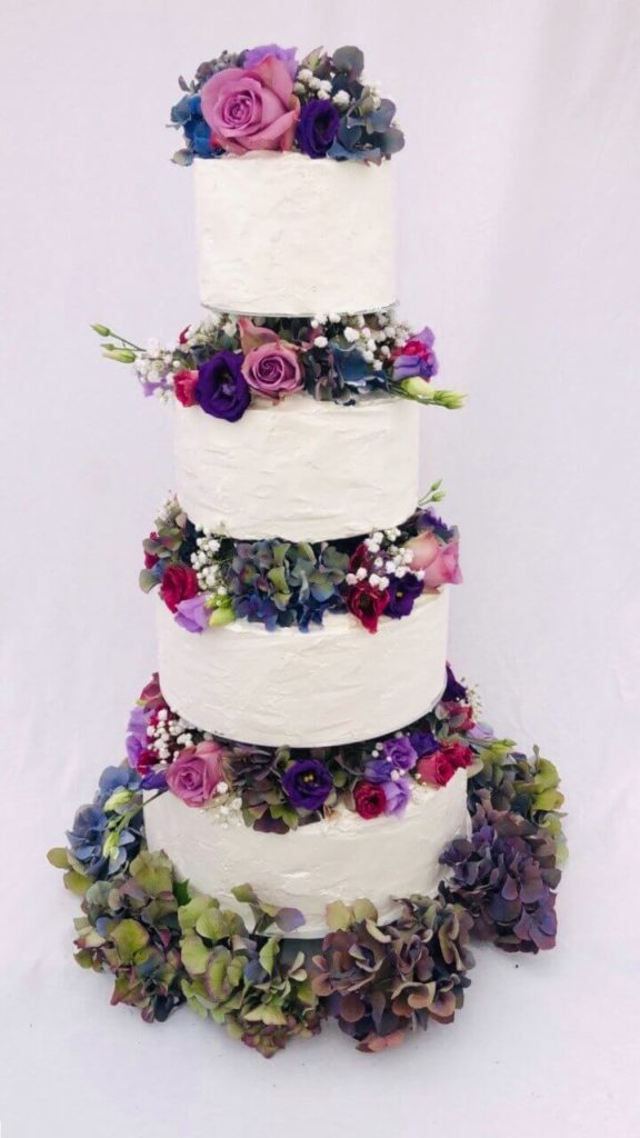 Hochzeitstorten Da Rino Bottrop vier stöckig mit Rosen